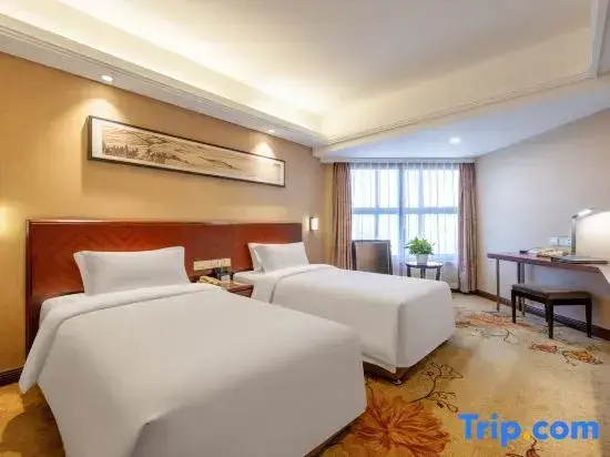 Xin Xing Hotel - Chambres