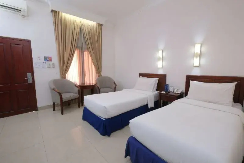Grand Orchid Hotel - Chambres