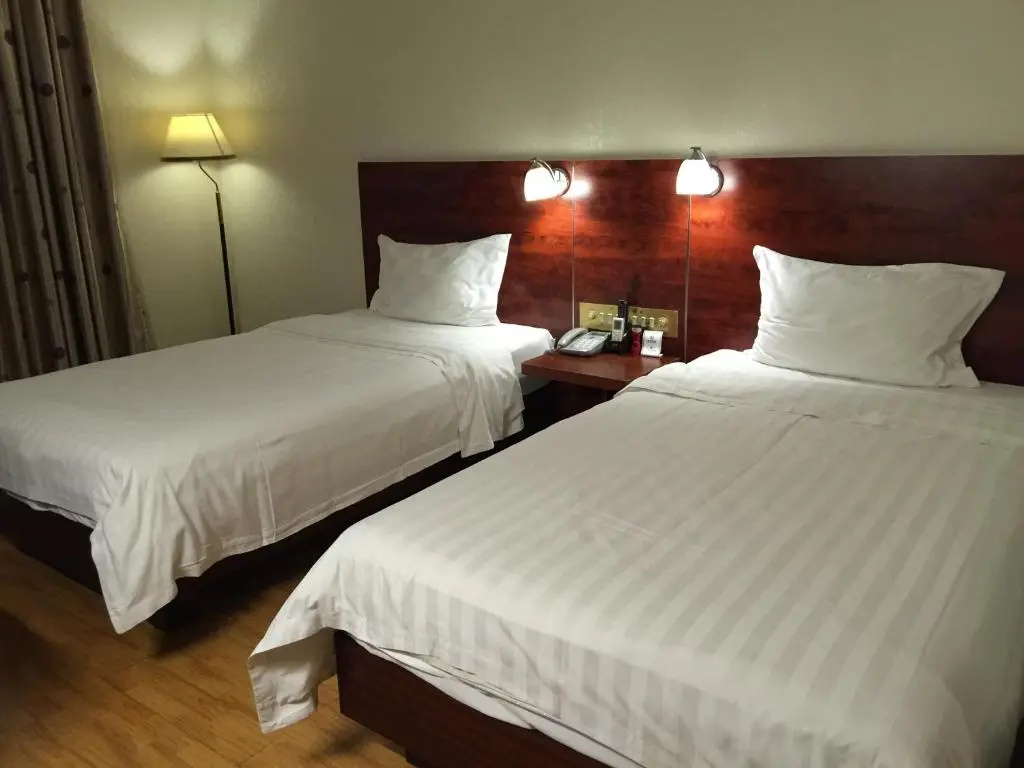 Guang Dong Hotel - Chambres