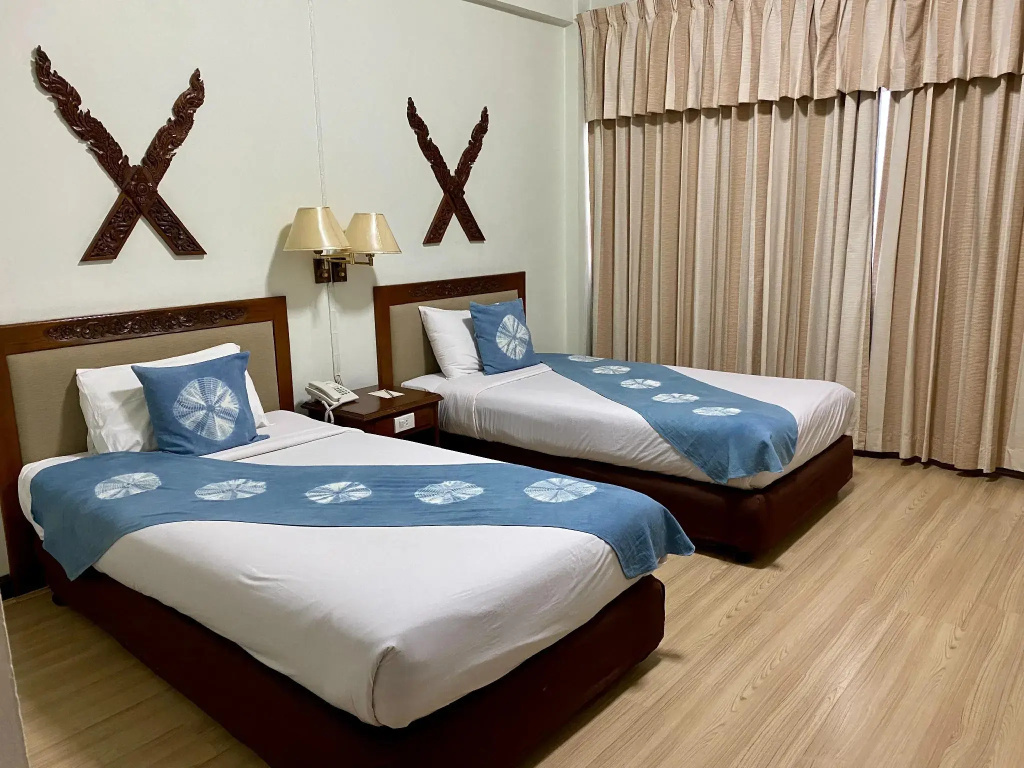 Mae Yom Palace Hotel - Chambres