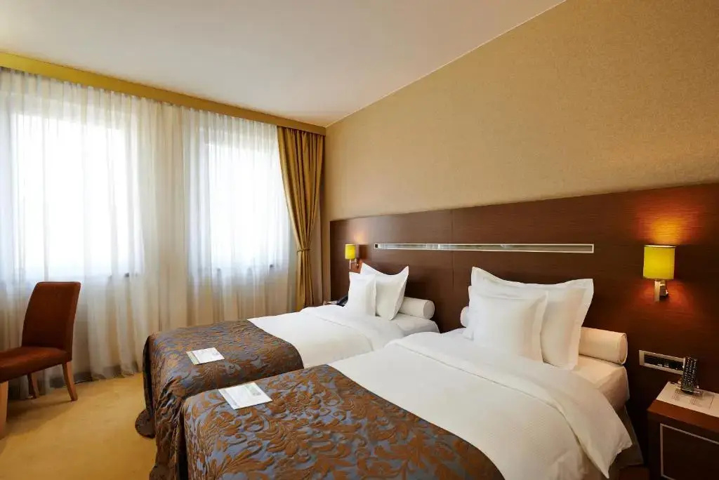 In Hotel Belgrade - Chambres