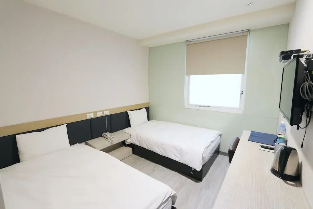 Chao She Hotel - Chambres