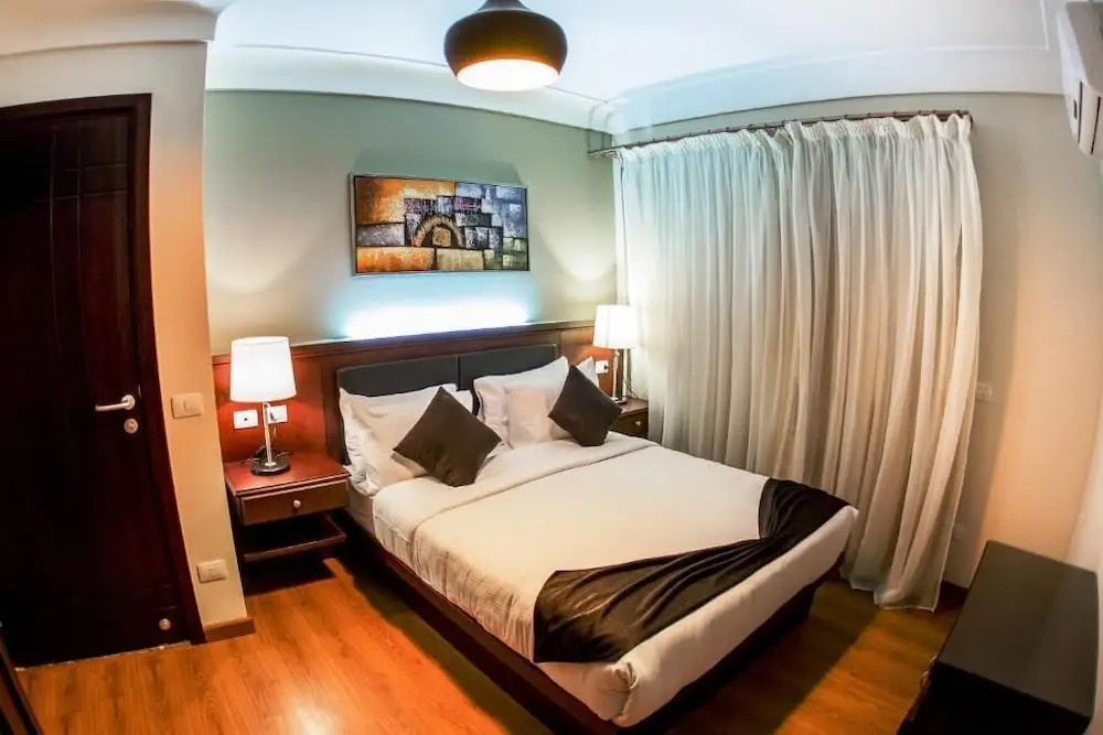 Panacea Suites Hotel - Chambres