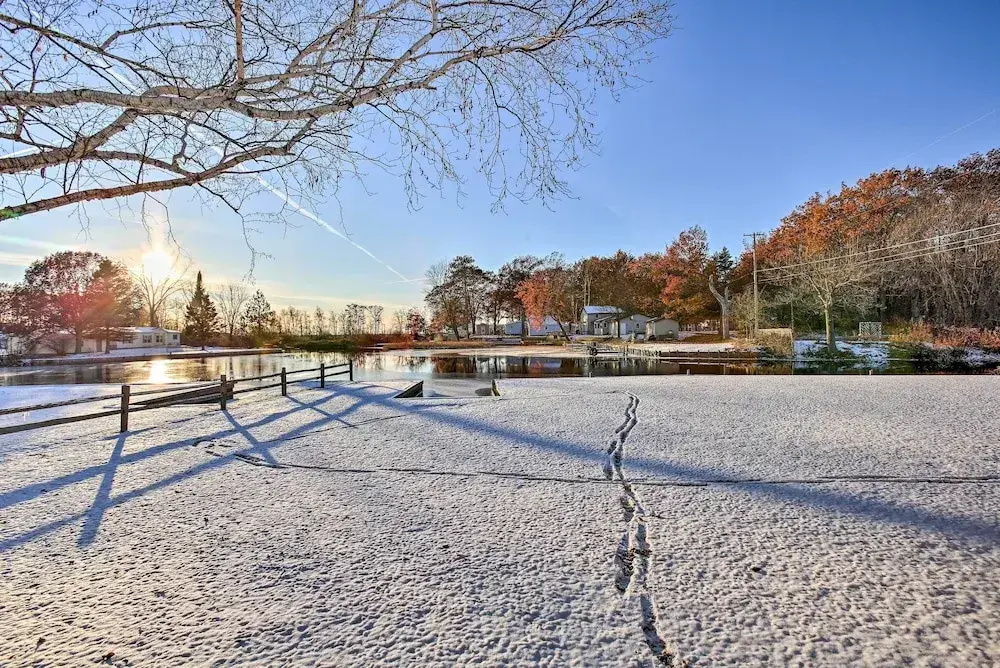 Cozy Riverfront Home w/ Fire Pit in Houghton Lake!
