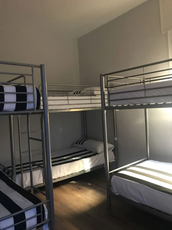 Кровать в общем номере в JMG Hostel Madrid