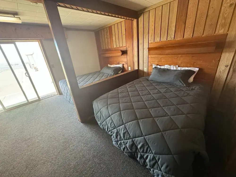 Standard Quadruple Basement room with partial ocean view