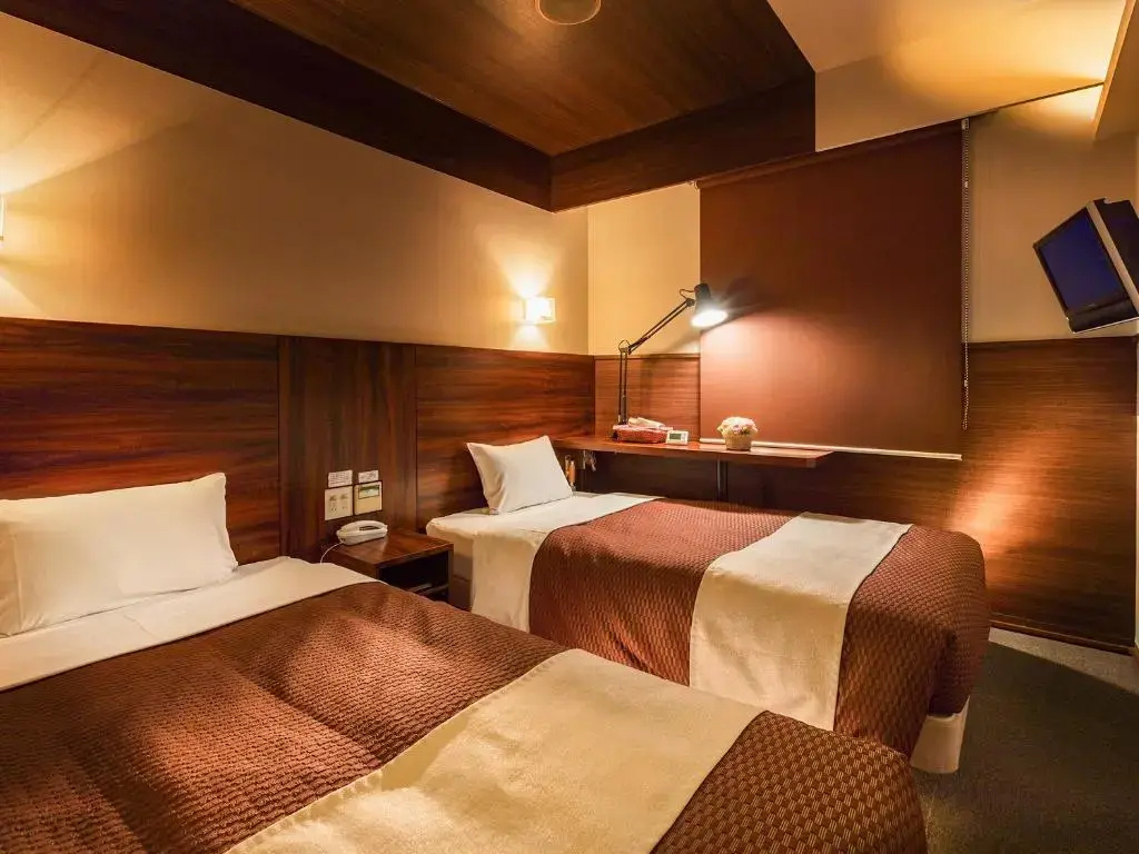 Tokai City Hotel - Chambres