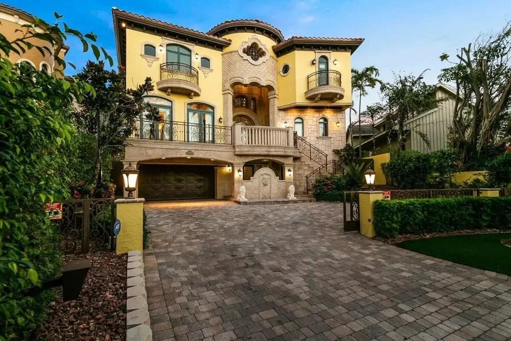 Luxurious 3-story Estate With Gym Pool Slide Private Beach and Lighthouse Views