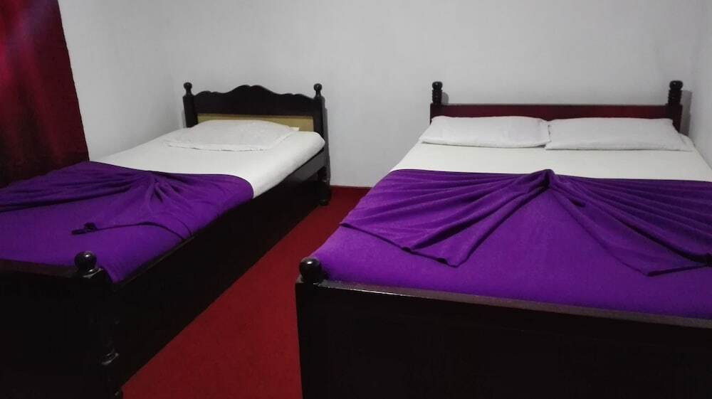 Трёхместный номер Deluxe c 1 комнатой с видом на горы односпальная кровать в Kumara Sevana - The Family Cottage