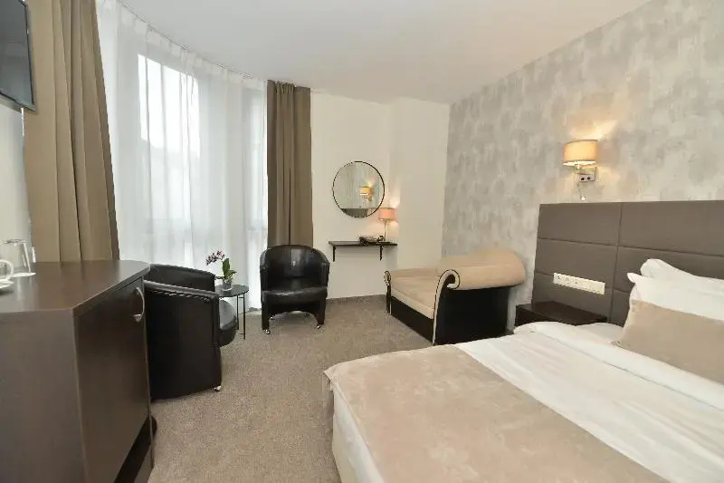 Art Plaza Hotel - Chambres