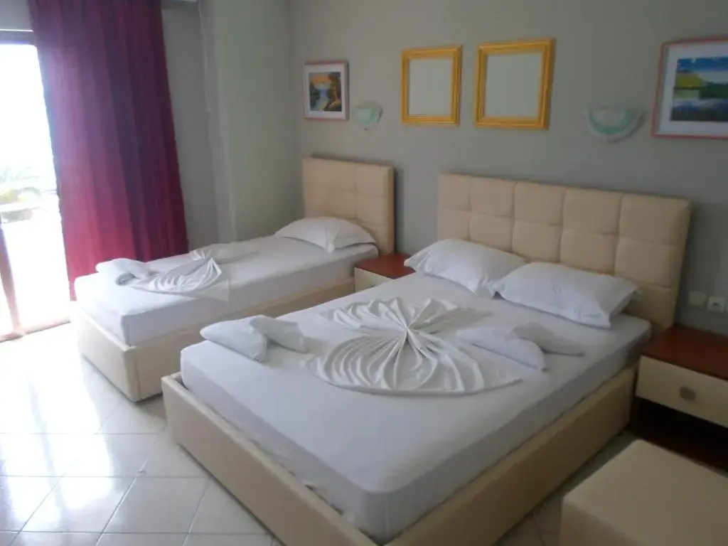 Standard Quadruple room with balcony and with sea view