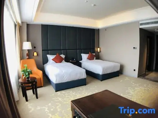 Yinlong Hotel - Chambres