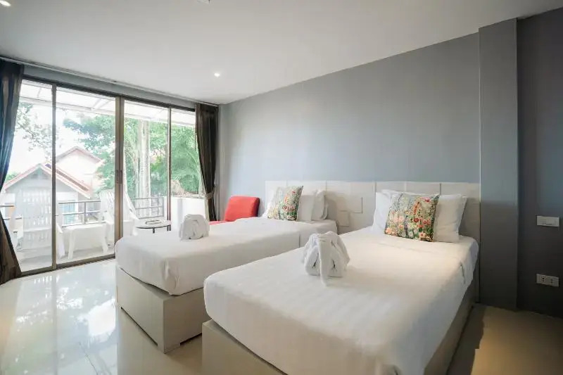 Двухместный номер Deluxe с балконом двуспальная кровать в Club Bamboo Boutique Patong Beach Resort