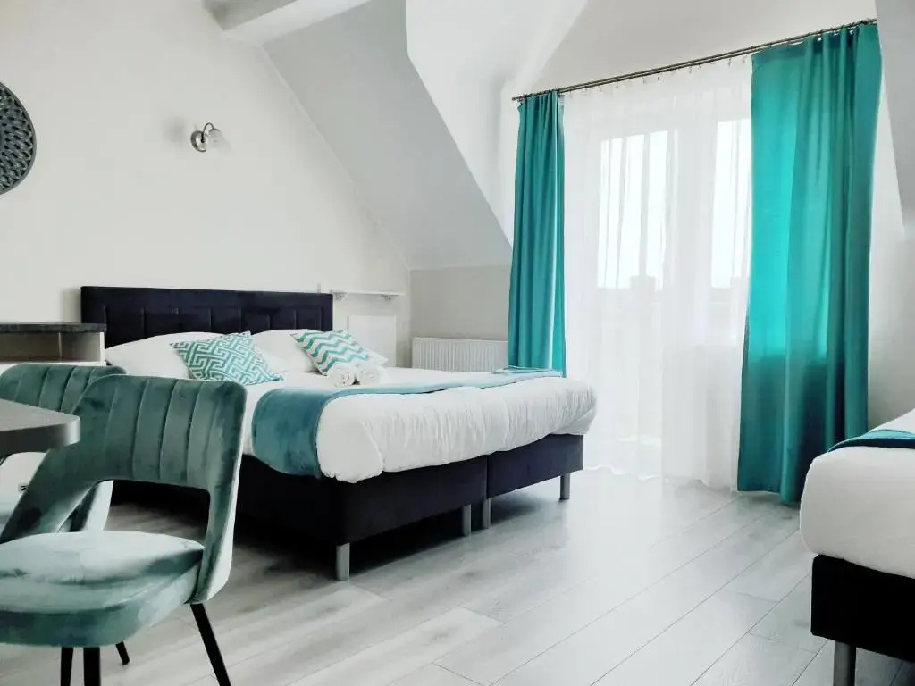 Deluxe Triple room with balcony