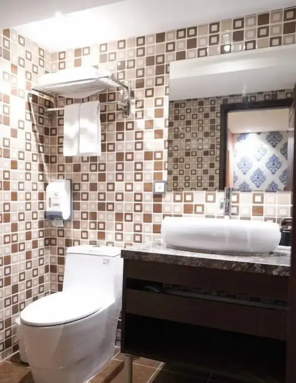 Talmud Hotel Yizhong - Chambres