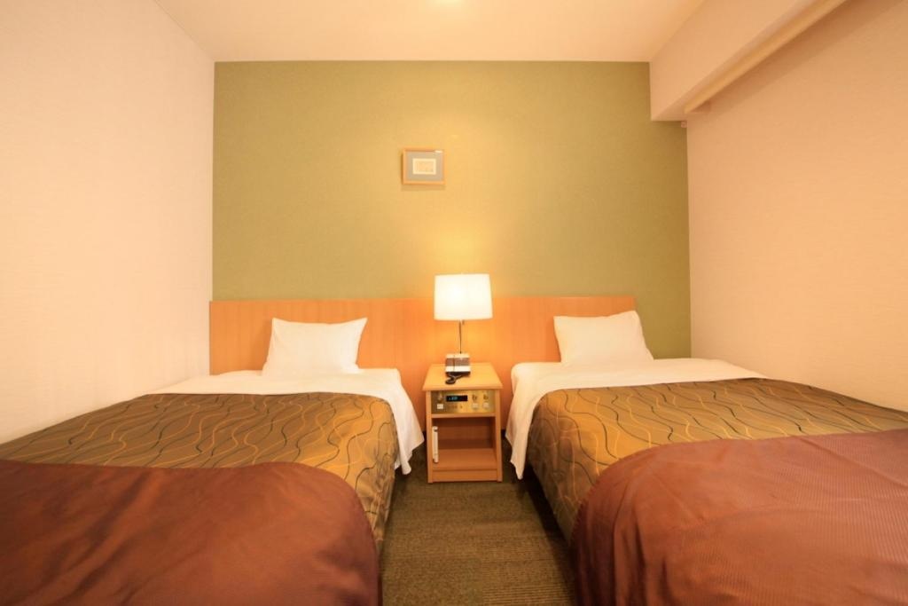 Hotel Grand City - Chambres
