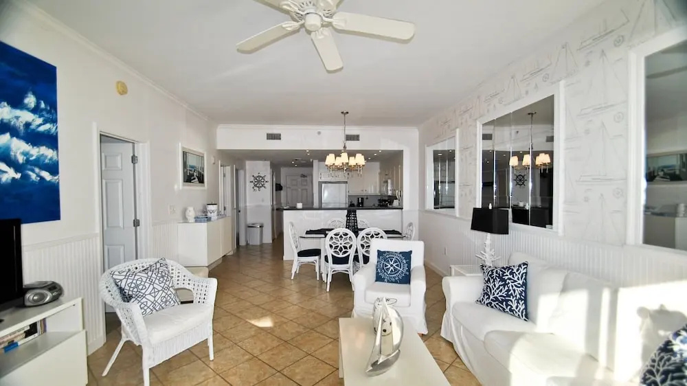 Ocean's Edge - Sip your coffee and watch the waves as you enjoy the gulf view balcony, accessible from the living room and the master bedroom 2 Condo by RedAwning
