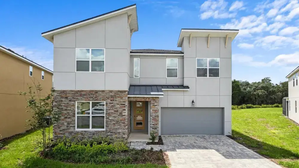 Striking 9BR Pond View Pool SPA Near Disney World, Kissimmee