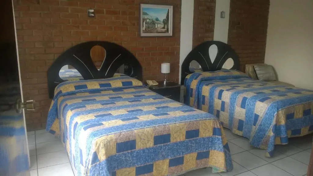Mariana's Petit Hotel - Chambres