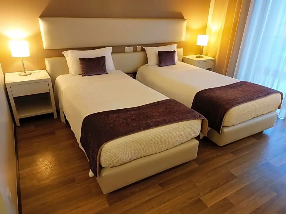 Monte Lírio Hotel - Chambres