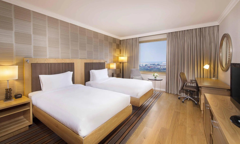 NH Johannesburg Sandton Hotel - Chambres