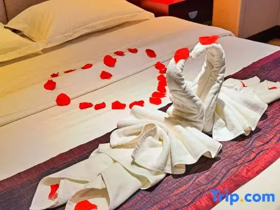 Xinmao Tiancai Hotel - Chambres