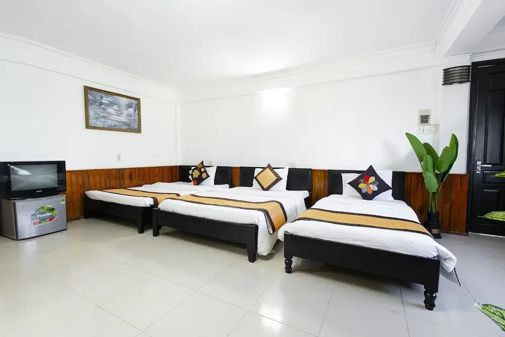Кровать в общем номере в Casablanca Hotel