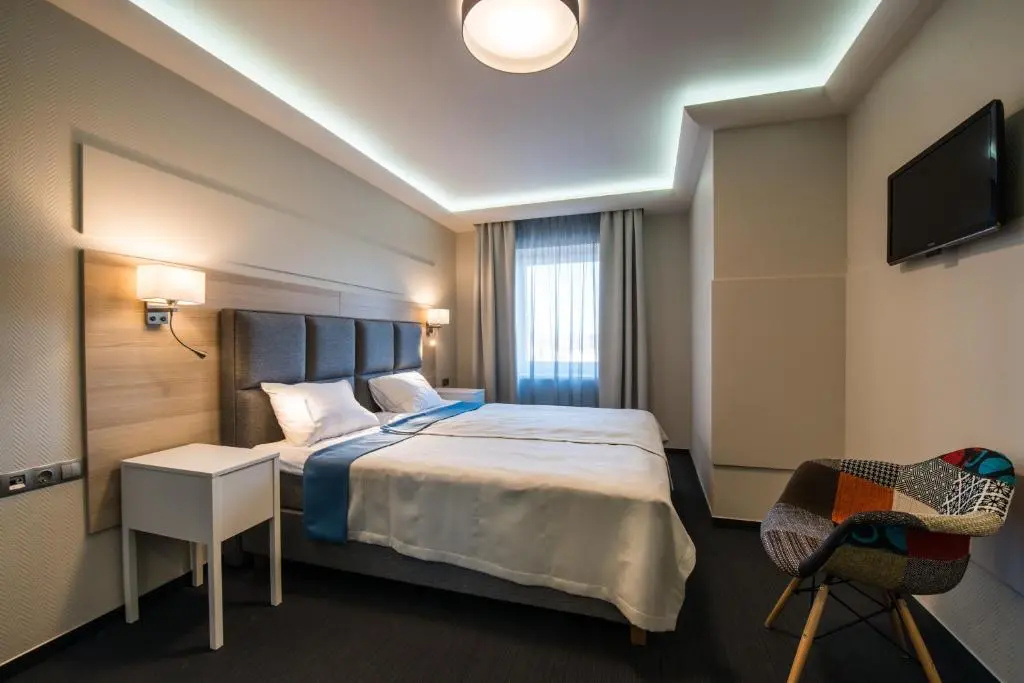 Amrita Hotel - Chambres