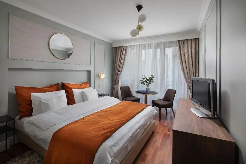 Queen's Court Hotel & Residence - Chambres