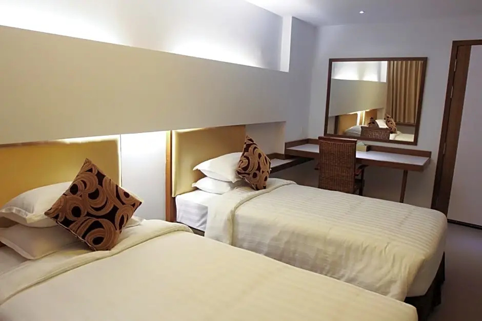 The RGN City Lodge - Chambres