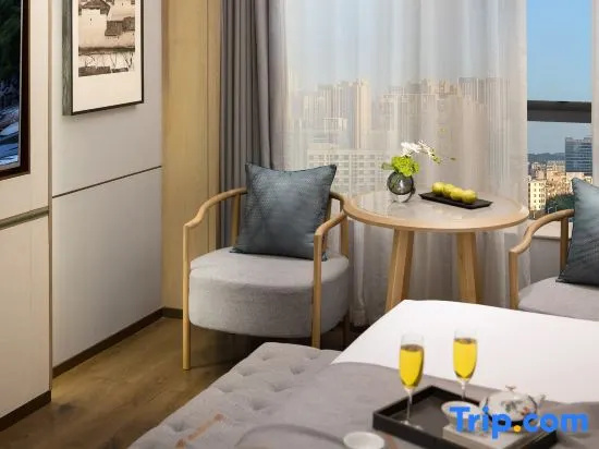 Haiyi Hotel - Chambres