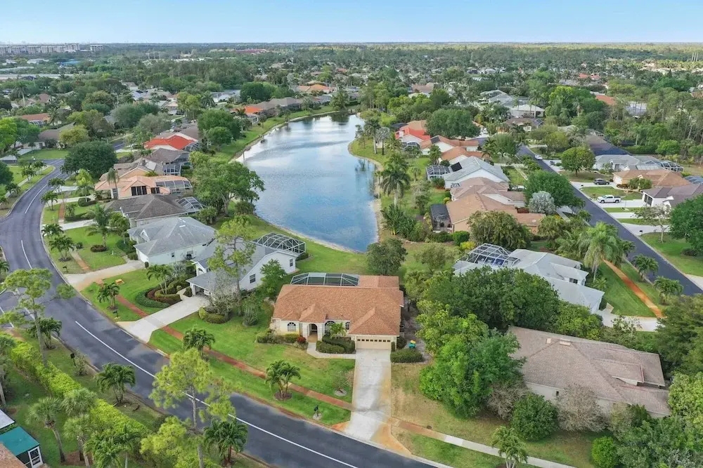 Private Pool, Pond Views, & Bonus Lounge in Gated Naples Community Drive to Dining & Sand