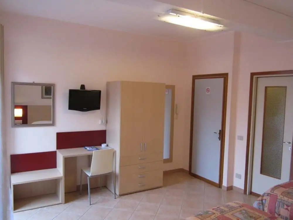 Standard Triple room with balcony and with partial view