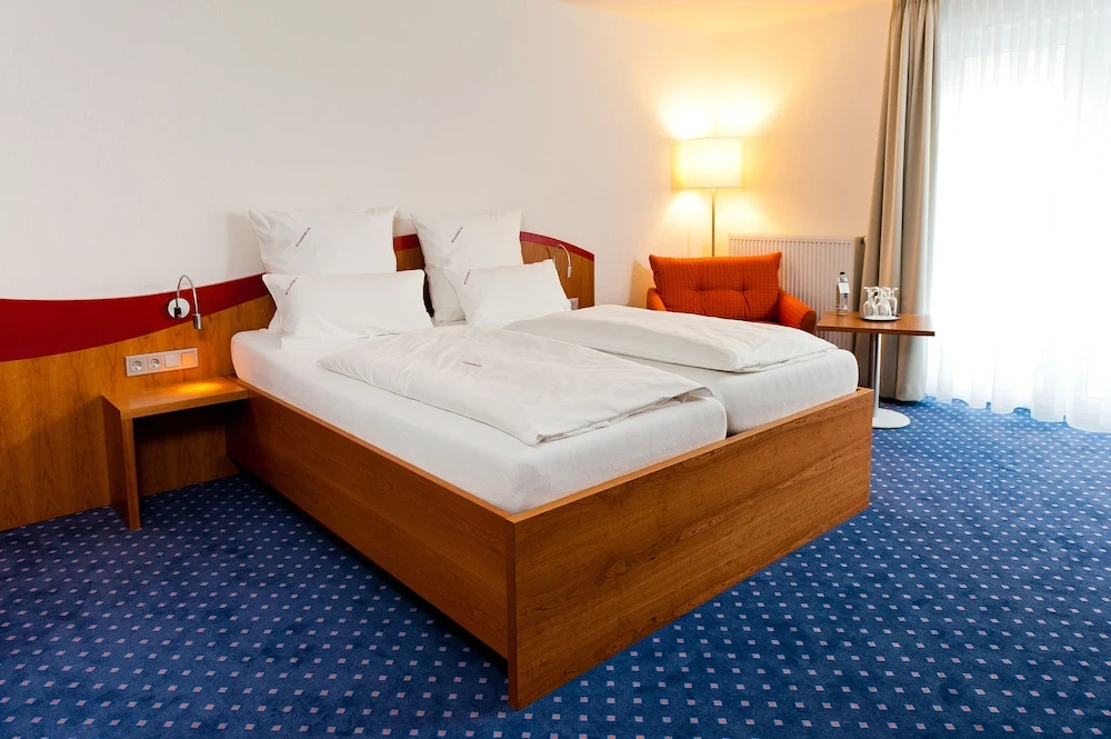 Komforthotel Butjadinger Tor - Chambres