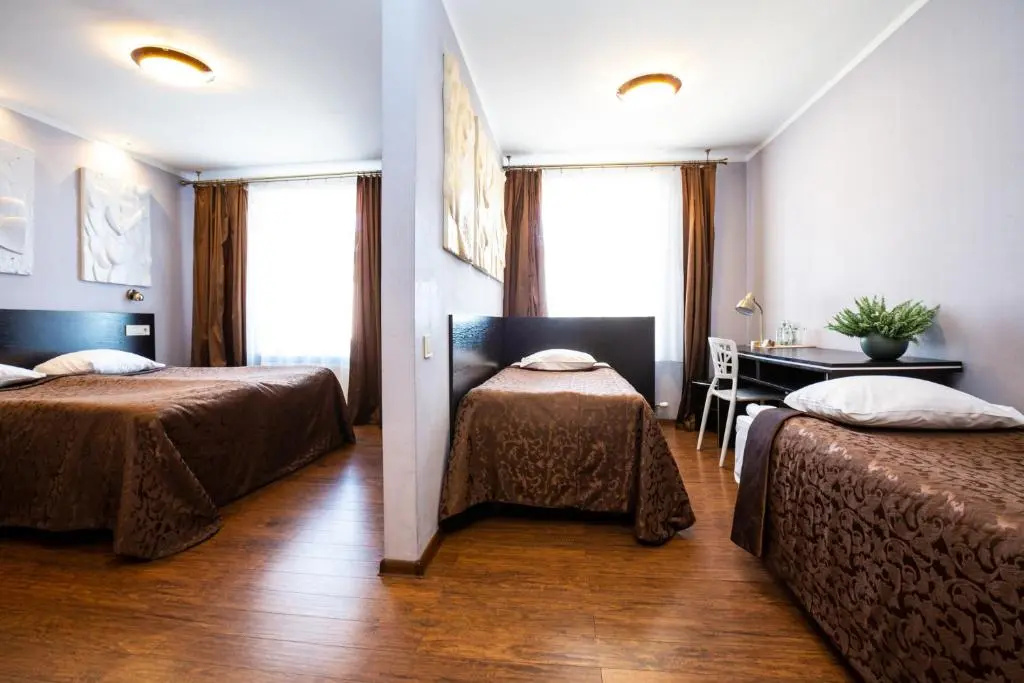 Primo Hotel - Chambres