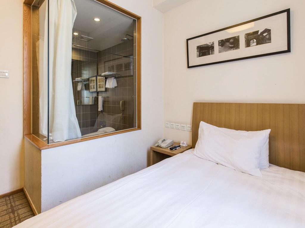 Traveler Inn Huaqiao Beijing Hotel by null