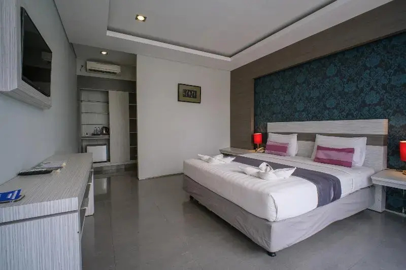 Kamini Legian Hotel - Chambres