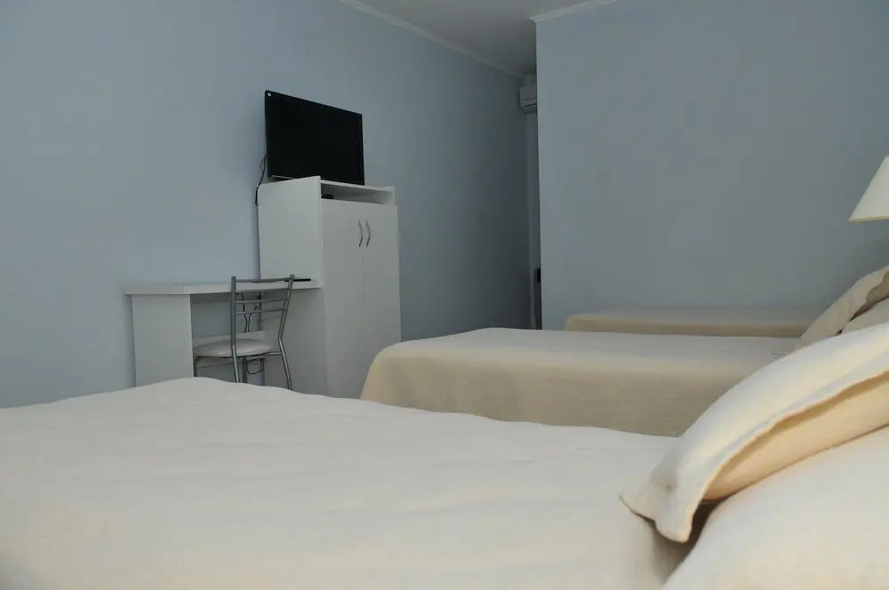Tagüé Hotel - Chambres
