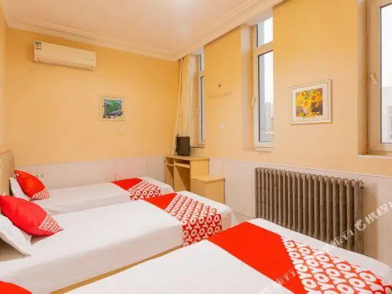 Xinggang Hotel - Chambres