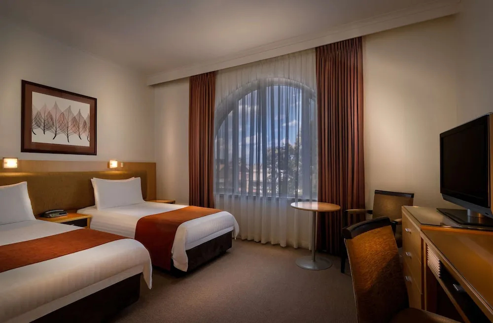 Best Western Plus Travel Inn Hotel - Chambres