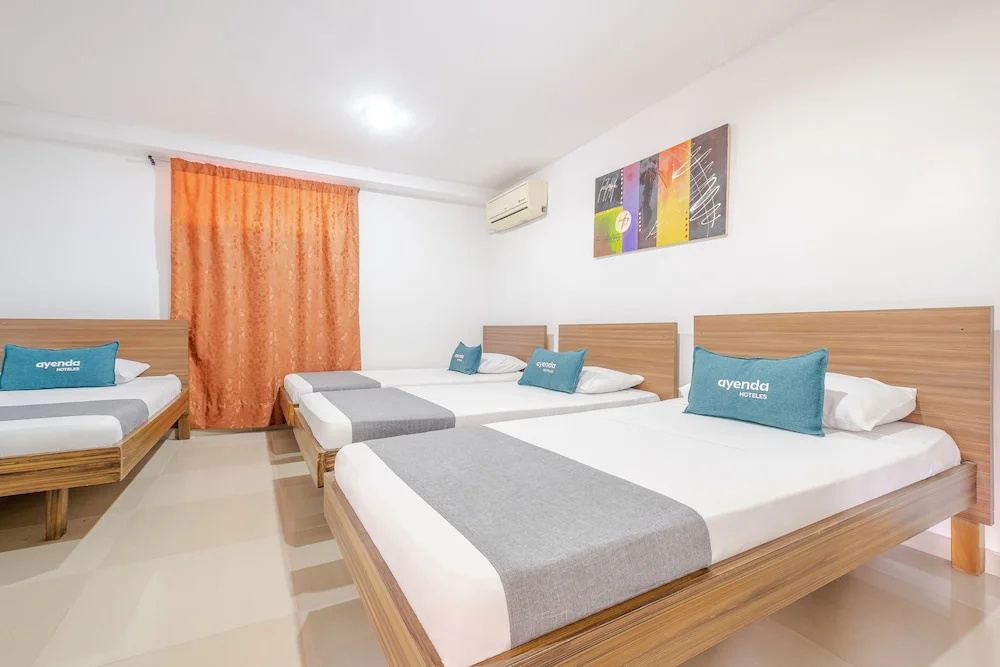 Hotel Metropolitana Plaza - Chambres