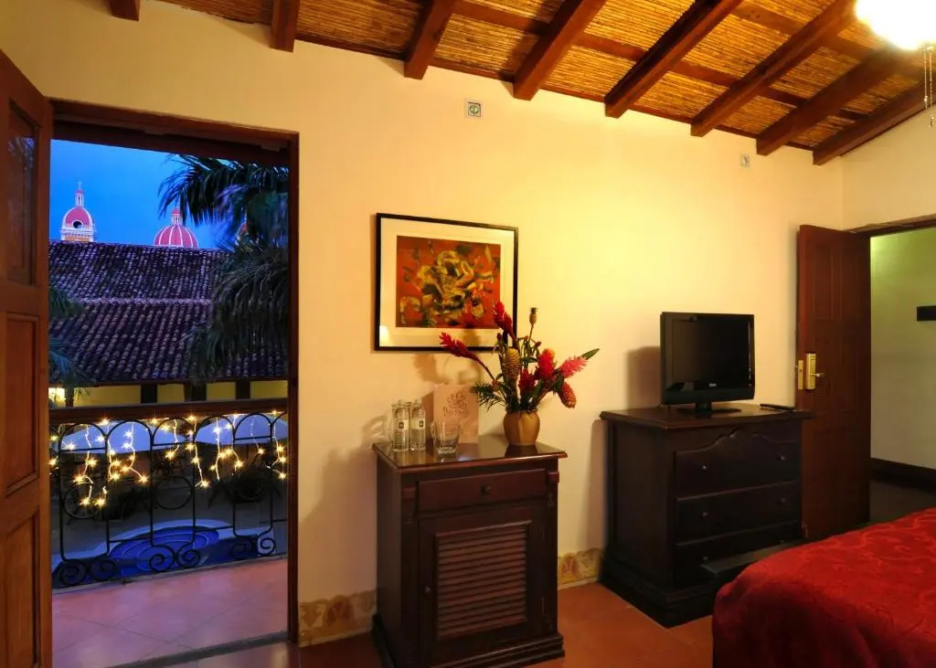Hotel Plaza Colon - Chambres