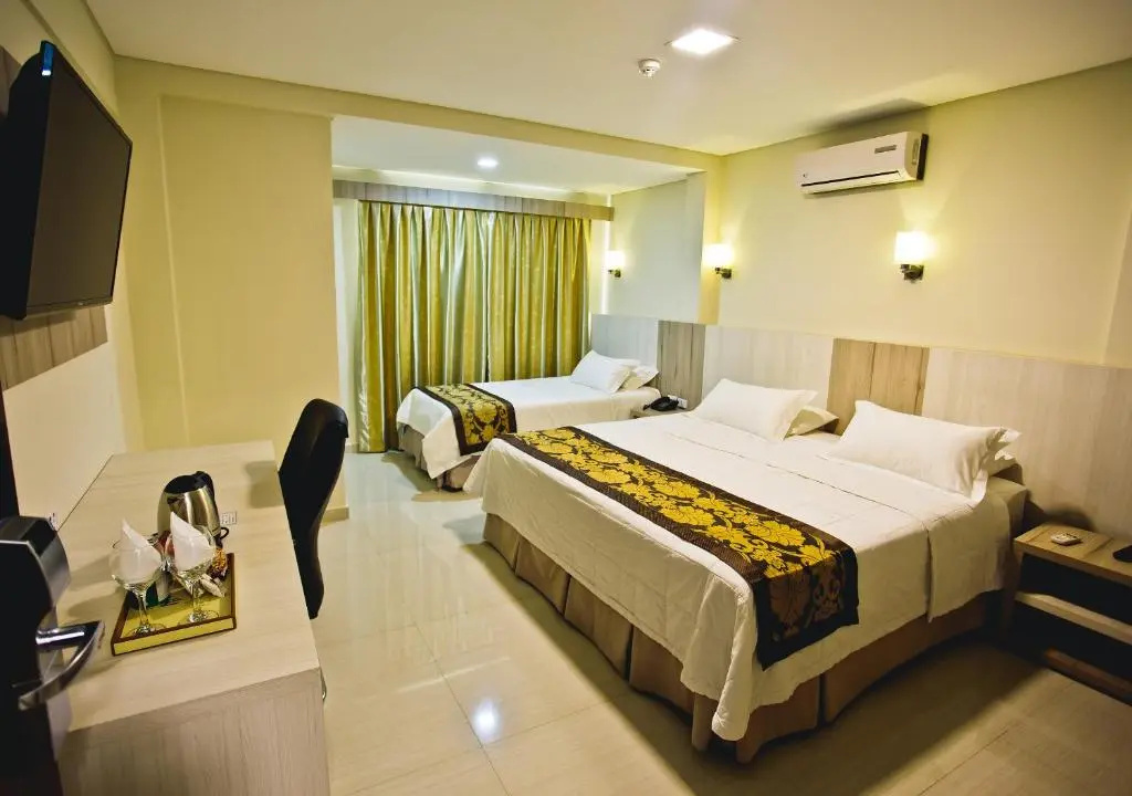 Megal Suites Hotel - Chambres