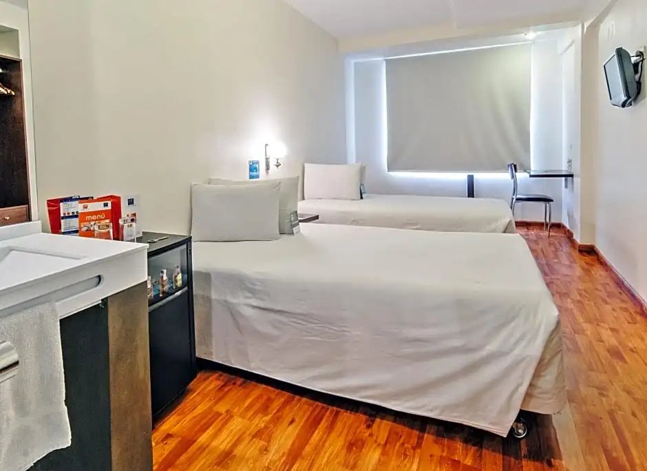 Hotel LP Columbus - Chambres