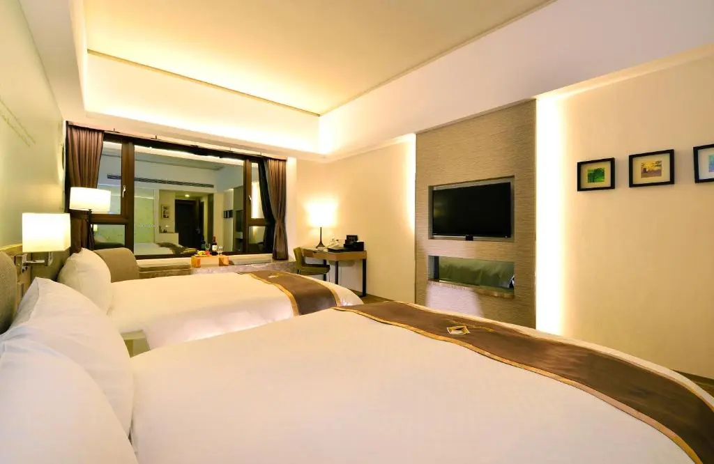 Tsun Huang Hotel - Chambres