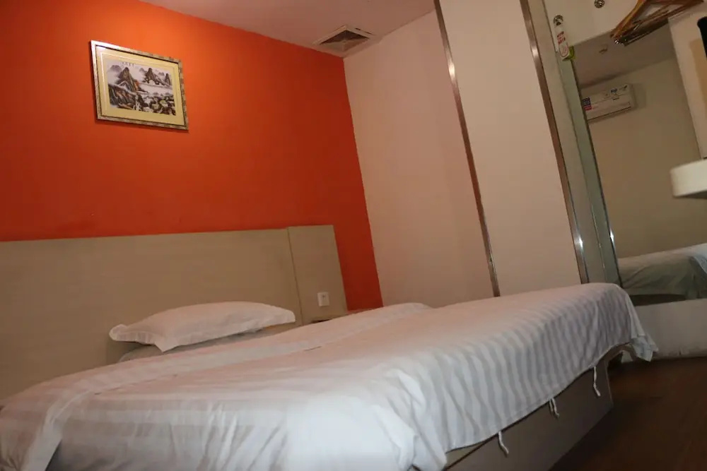 Yixin Business Hotel - Chambres