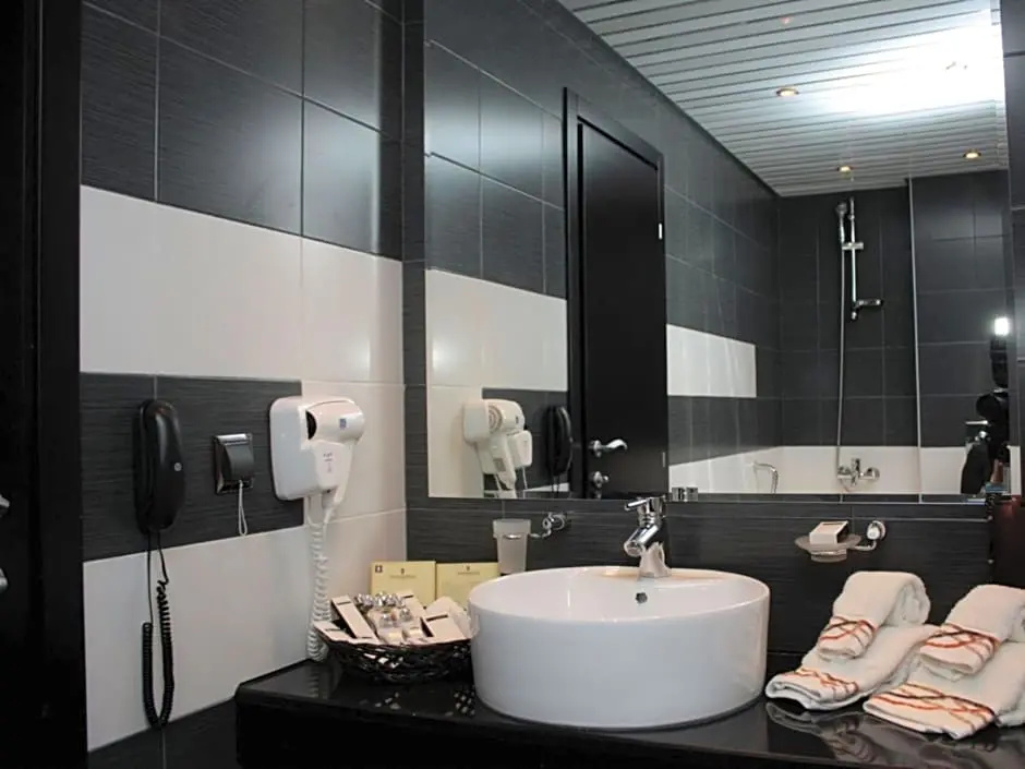 Cosmopolitan Hotel & Wellness - Chambres