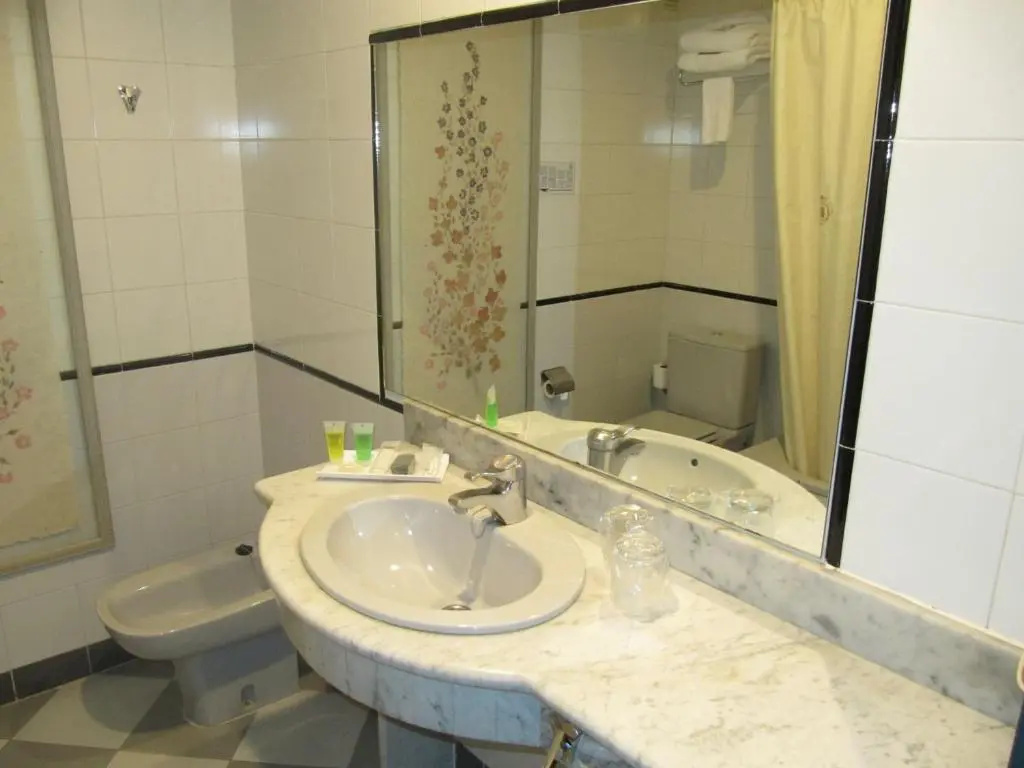 Hotel Sercotel Cuatro Postes - Chambres