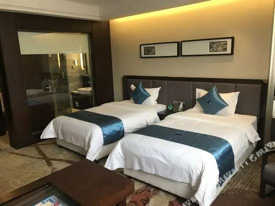 Qianxi Business Hotel - Chambres