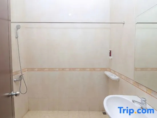 Multazam Syariah Hotel - Chambres